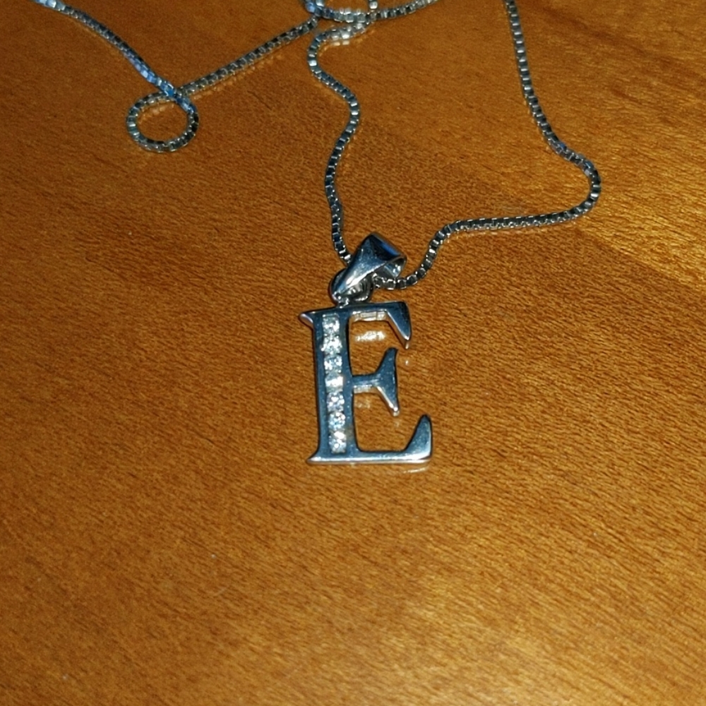Silver and cz "E" necklace